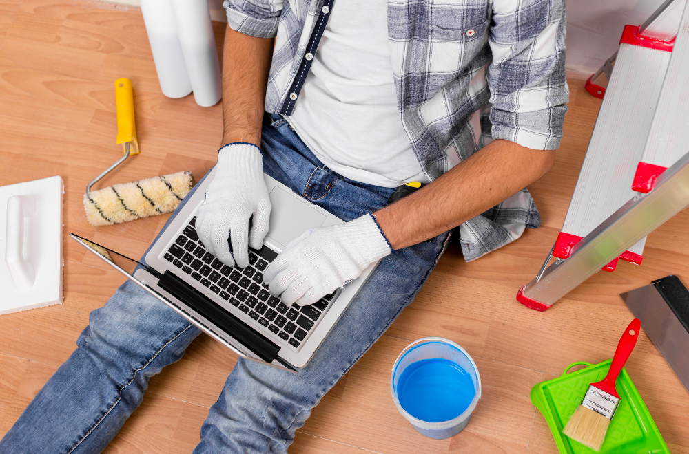 top-view-young-man-holding-laptop